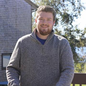 A photo of student Sean Nugent standing outside 